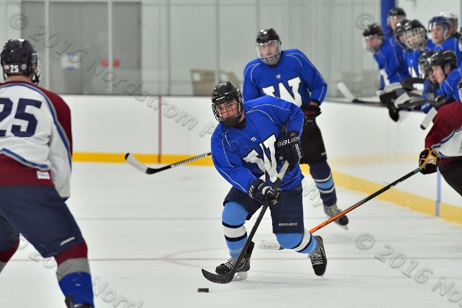 Wheaton College Men\'s Ice Hockey vs Middlesex Community College. - Photo By: KEITH NORDSTROM